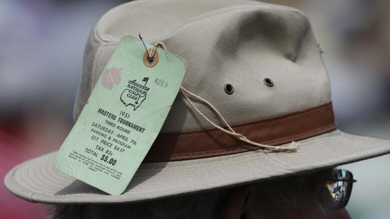 A patron wears a ticket from the 1951 Masters Tournament on his hat. REUTERS/Mike Segar (UNITED STATES - Tags: SPORT GOLF)